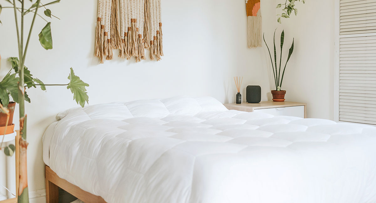 White comforter on a mattress